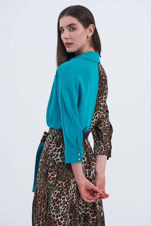 Trend Kadın Leopar desenli ve turkuaz detaylı şık elbisemiz!