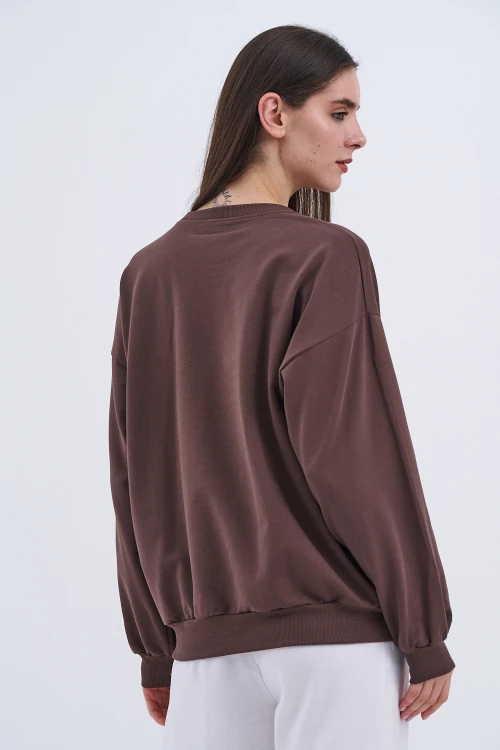 Trend Kadın Şıklığı ve rahatlığı bir arada sunan Sweatshirt.